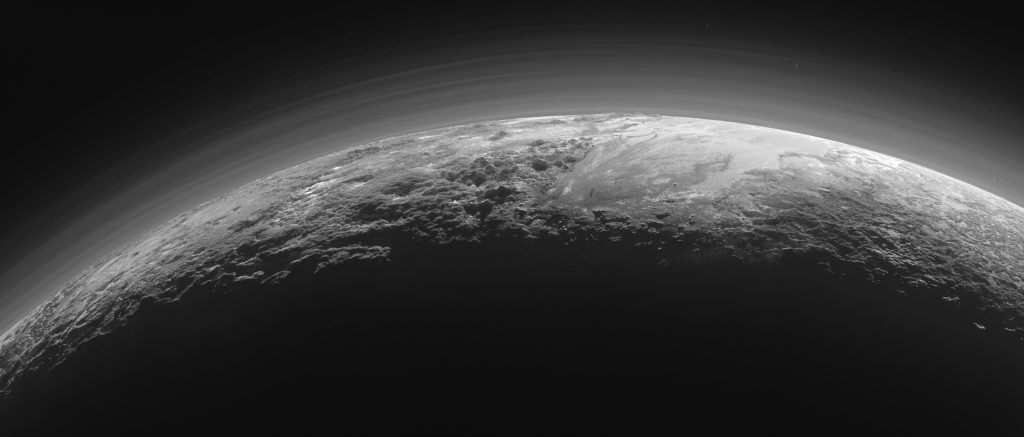 Pluto's_Majestic_Mountains,_Frozen_Plains_and_Foggy_Hazes